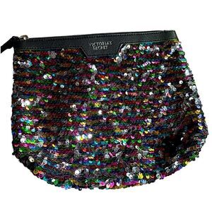 Victoria’s Secret Multicolored or Black Sequined Clutch Bag.